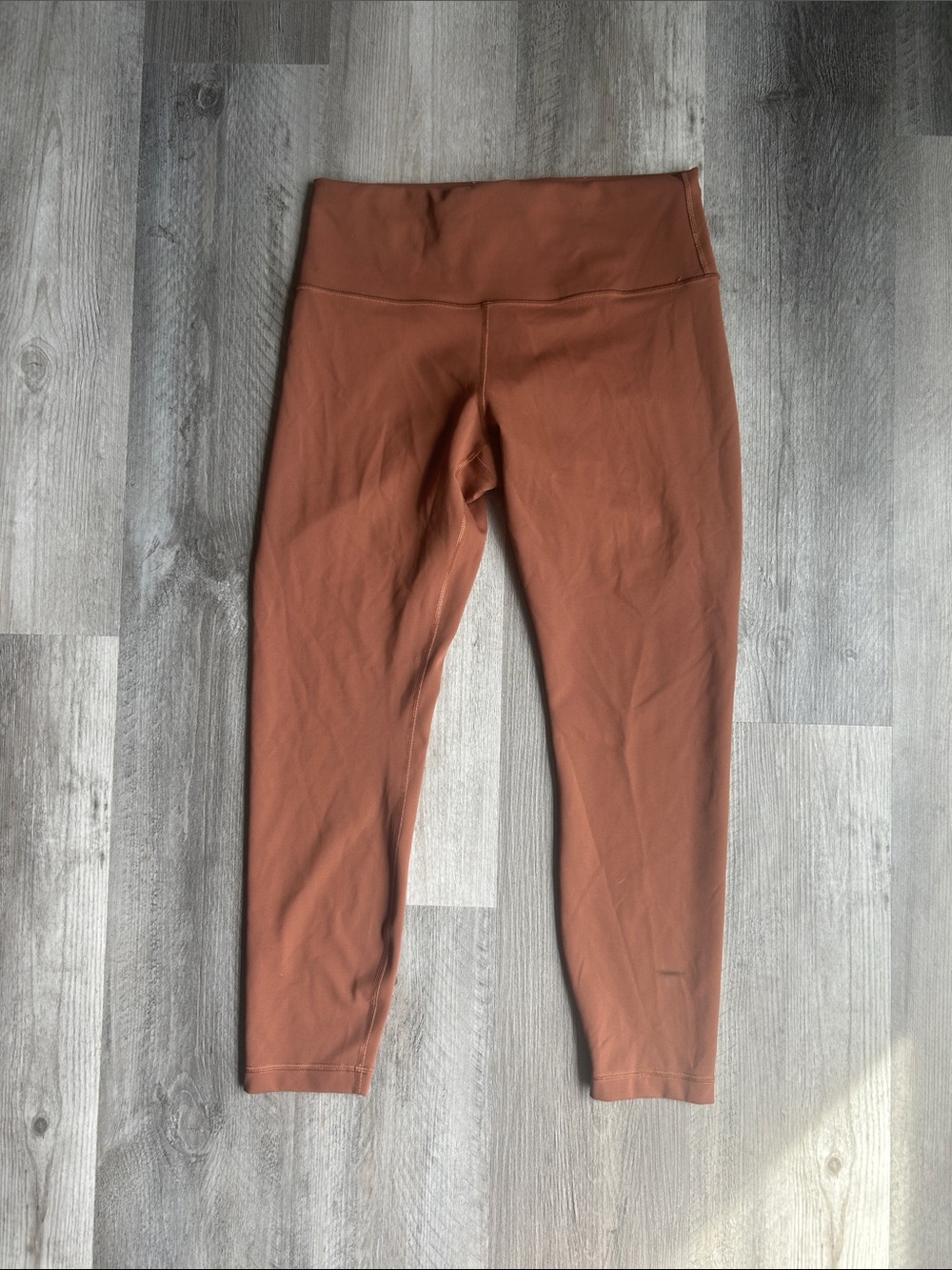 lululemon Wunder Train High-Rise Tight 25” – Size 12 – Dark Terracotta